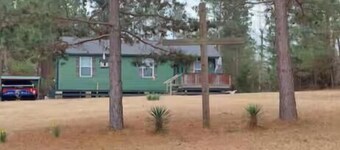 Relax in the woods in this quaint 3-bedroom house with a pool in Kennard.