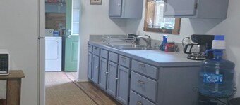 Relax in the woods in this quaint 3-bedroom house with a pool in Kennard.
