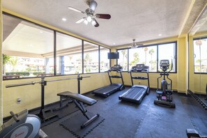 A gym with treadmills, a bench, and a weight bench. - Marina Pinacate B-302 (Puerto Peñasco)