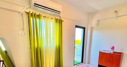 Brand new condo with free access to parking 5 minute walk to white sand beach