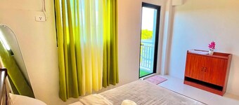 Brand new condo with free access to parking 5 minute walk to white sand beach