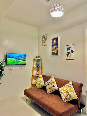 Living area - Brand new condo  with  free access to parking  5 minute walk to white sand beach (tagbilaran)