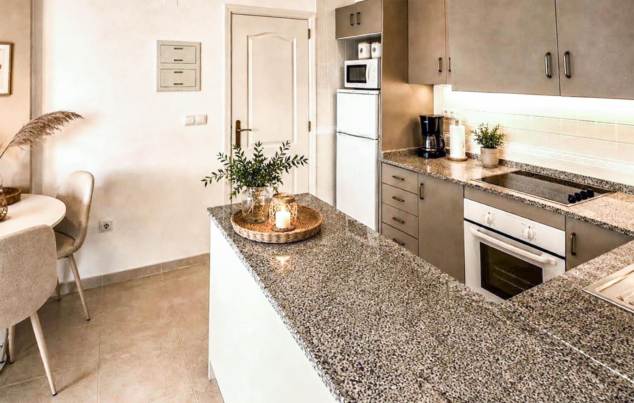 Coffee/tea maker, fridge, microwave, oven