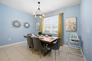 Dining - Renovated resort 5br themed pool, game room, game room, ambient pool lighting (Kissimmee)
