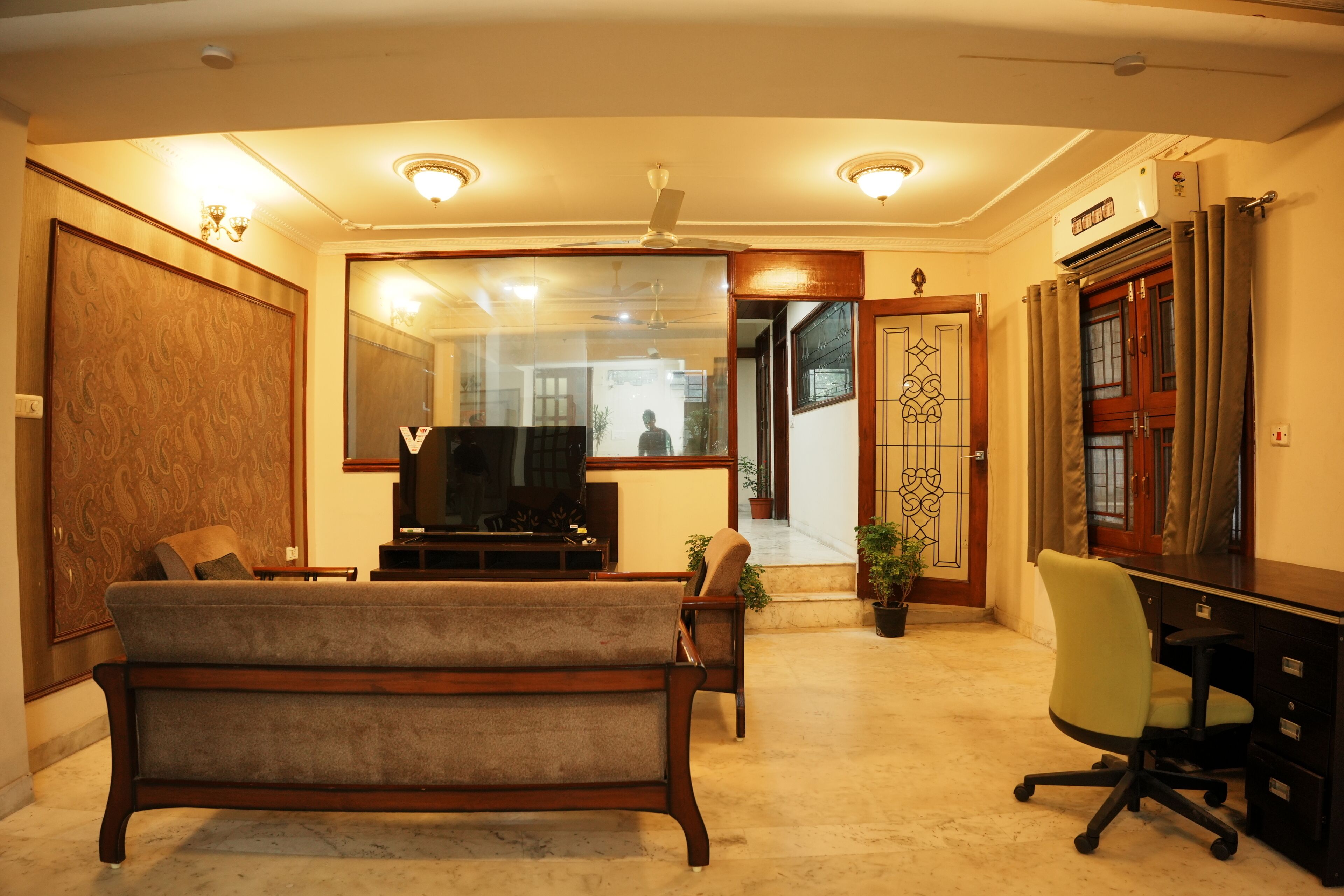 Luxury Room | Living room | 32-inch flat-screen TV with cable channels
