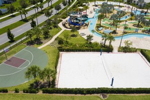 An aerial view of a park with a basketball court, a swimming pool, and a children's play area. - 401 - Beyond the Sea & Into the Stars (Kissimmee)