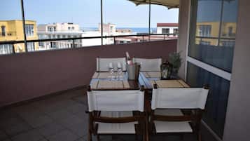 Comfort Apartment, Balcony, Garden View | Outdoor dining