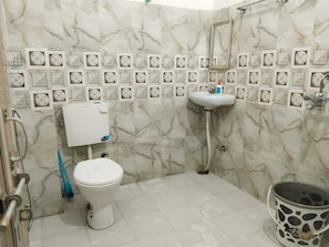 Standard Room, Air conditioning, City View | Bathroom | Shower, free toiletries, towels, soap - Kashi Ghat Haven Homestay (Varanasi)