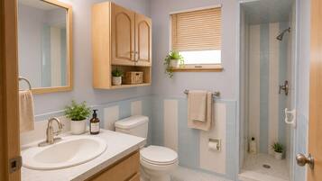 Shower, bidet, towels, soap