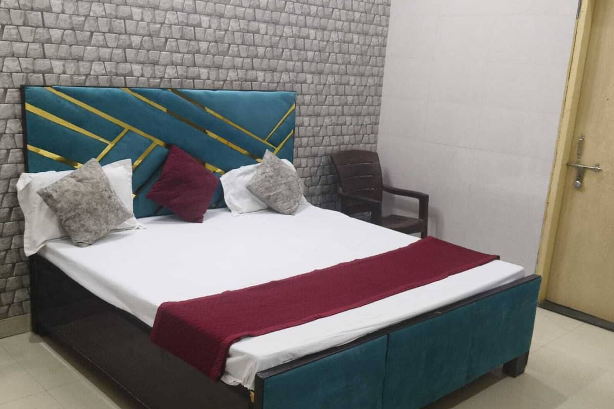Habitación Deluxe, aire acondicionado | Camas extra, wifi gratis y ropa de cama