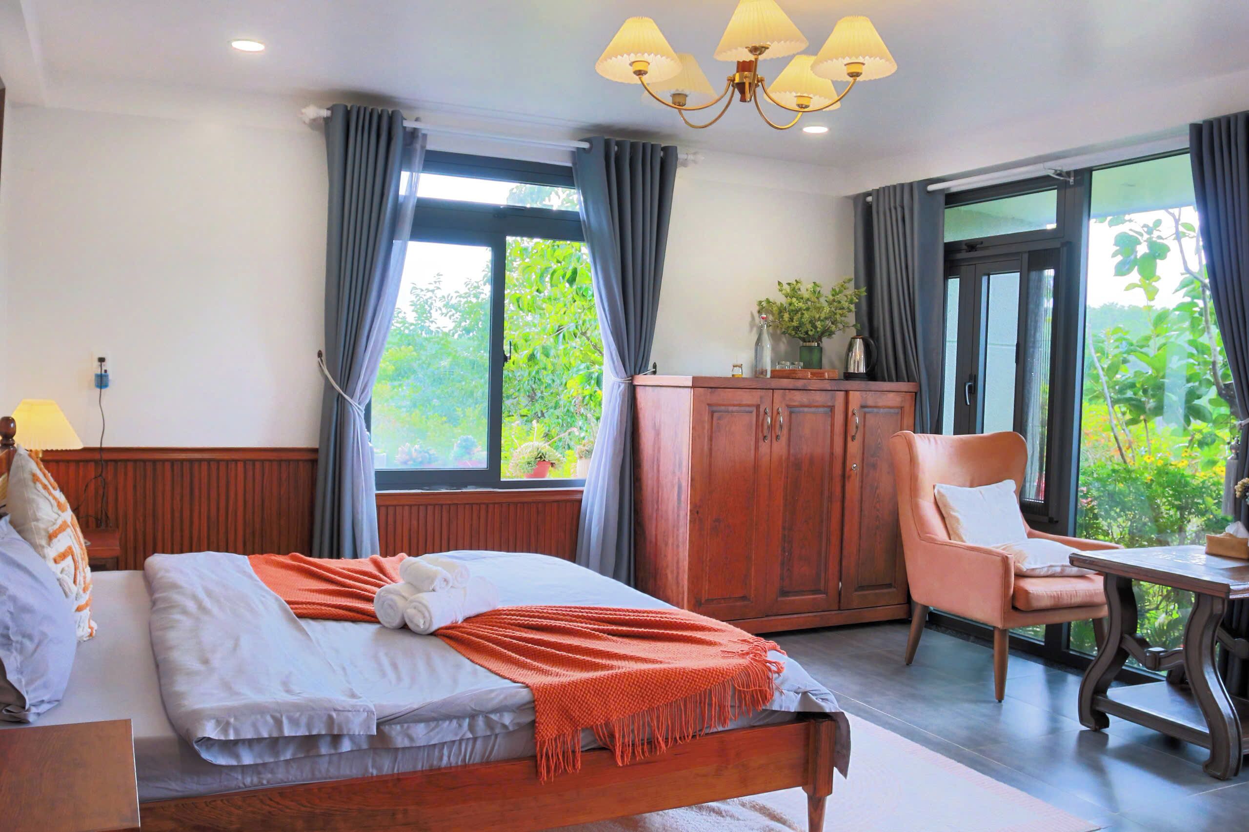 Deluxe Room, Balcony, Resort View | Desk, laptop workspace, blackout curtains, iron/ironing board