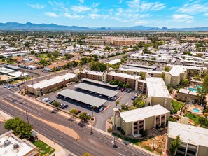 A commercial area with multiple buildings, roads, and a parking lot. - Resort Pool + Spa + Balcony | Fashion Square + Echo Canyon | Camelback Cabana (Scottsdale)