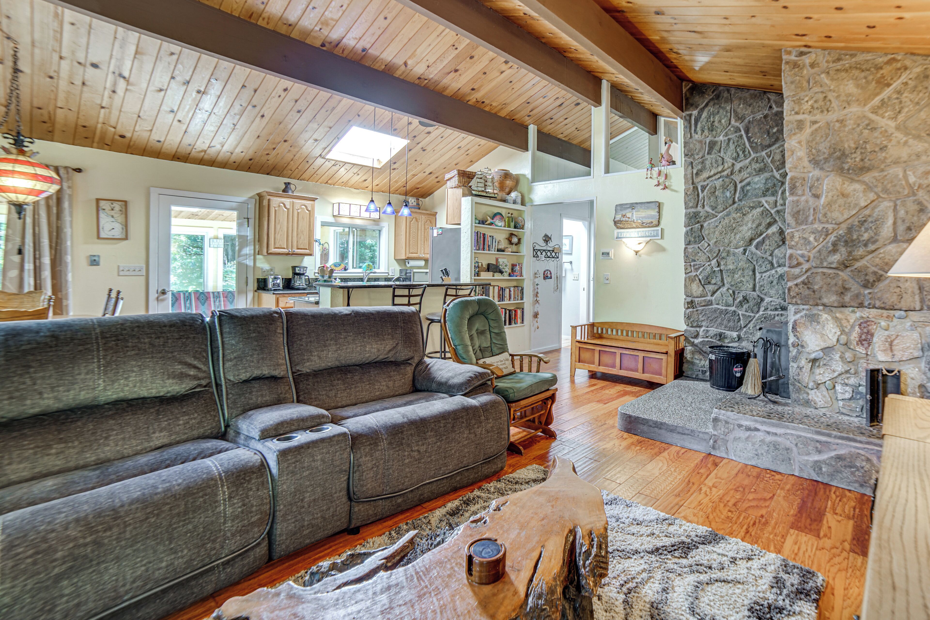 TV, fireplace, books
