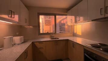 Deluxe Condo, 3 Bedrooms, Balcony, Sea View | Private kitchen | Fridge, oven, stovetop, cookware/dishes/utensils