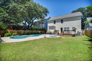 A residential backyard with a swimming pool, a covered patio area, and a fenced yard. - 1 Block to Beach + Private Patio in Norfolk (Norfolk)