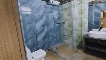 Luxury Double Room, Courtyard View | Bathroom | Shower, slippers, towels, soap