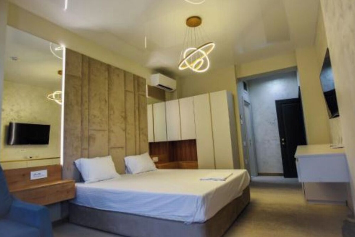 Deluxe Double Room, Balcony | In-room safe, soundproofing, iron/ironing board (on request), free WiFi