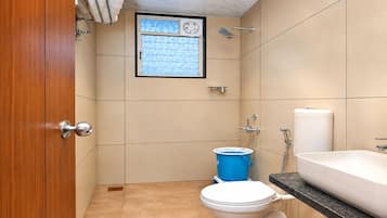 Deluxe Room, Balcony, Garden View | Bathroom | Free toiletries, hair dryer (on request), towels, soap