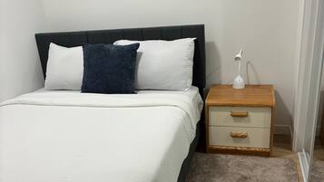 2 bedrooms, desk, iron/ironing board, travel crib