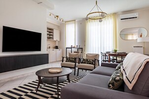 Appartamento familiare, 1 camera da letto, balcone (Welcome Suite) | Area soggiorno