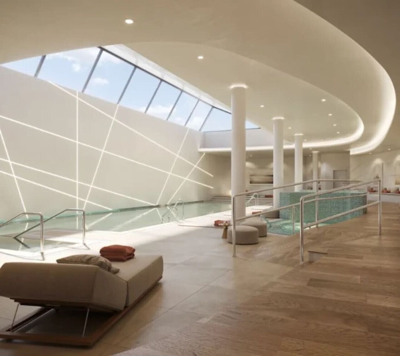 A modern interior with a pool, seating areas, and a glass ceiling.