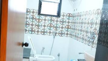 Suite, City View | Bathroom | Shower, towels, soap, shampoo