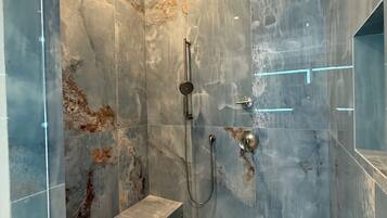Shower, eco-friendly toiletries, hair dryer, bidet