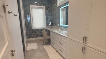 Shower, eco-friendly toiletries, hair dryer, bidet