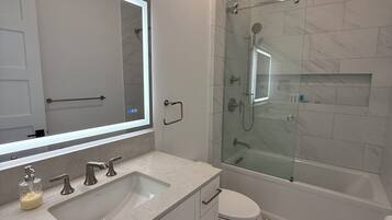 Shower, eco-friendly toiletries, hair dryer, bidet