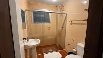 Basic Twin Room | Bathroom | Shower, towels, soap, toilet paper