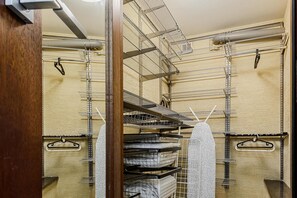 A multi-level metal staircase with metal railings and a series of bunk beds with mattresses. - Central Flat on Sienkiewicza (Łódź)