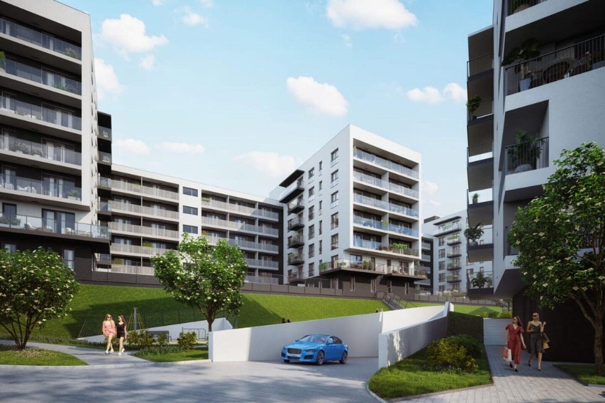 A modern residential complex with multiple apartment buildings, a central courtyard, and a blue car parked in the middle.