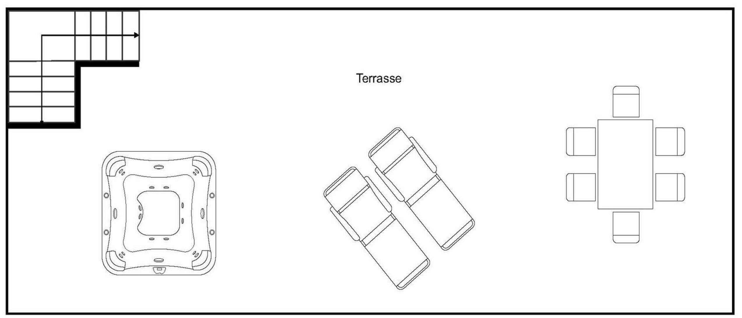 Una terrazza con area salotto e tavoli.