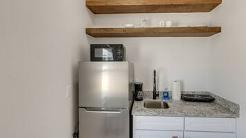 Fridge, microwave, toaster, cookware/dishes/utensils