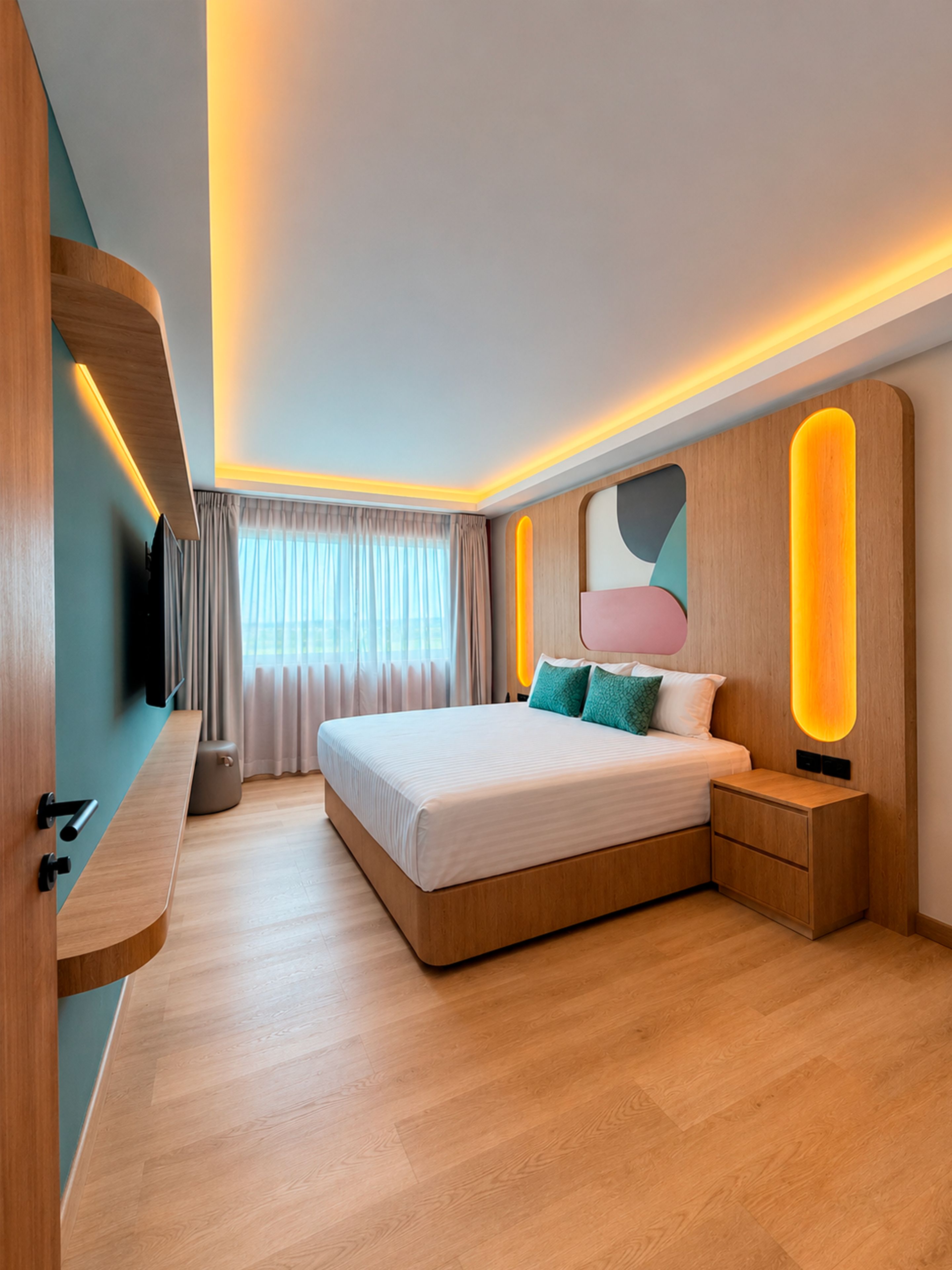 A modern bedroom with a large bed, bedside tables, a TV, and a window with curtains.