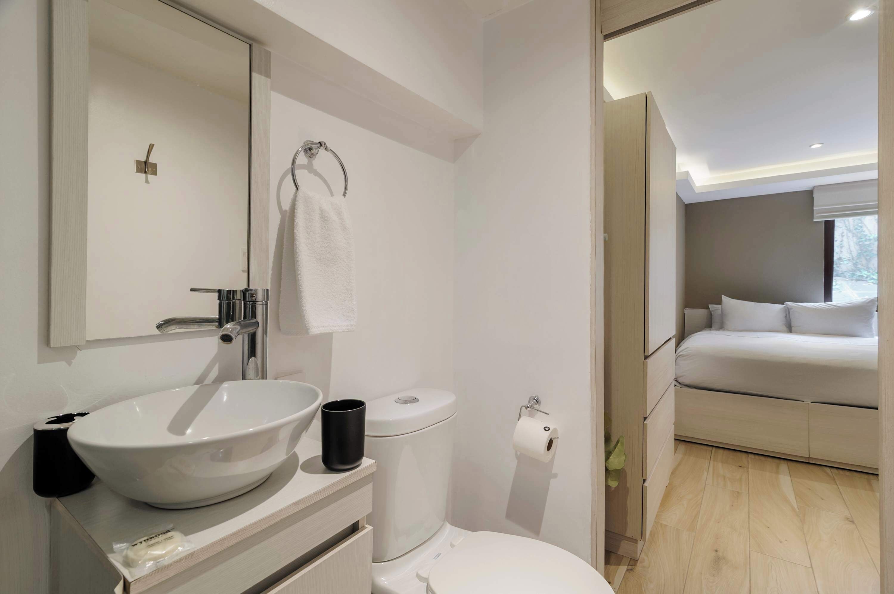 Shower, hair dryer, towels, shampoo