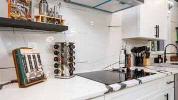 Coffee/tea maker, fridge, microwave, oven