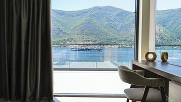 Habitación triple Deluxe, vistas al mar | Interior