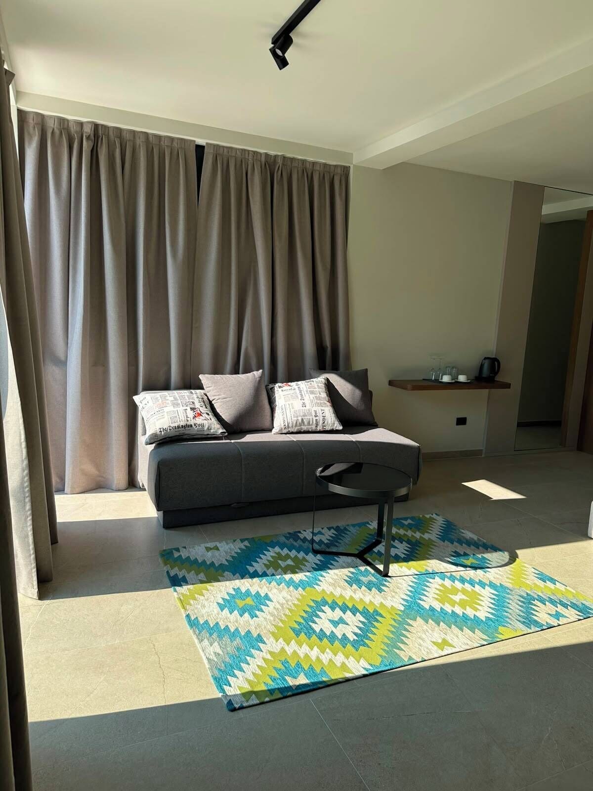 Deluxe Quadruple Room, Balcony, Sea View | Room amenity