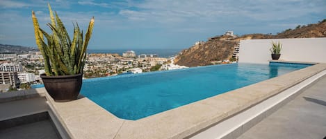 Outdoor pool, pool umbrellas, pool loungers