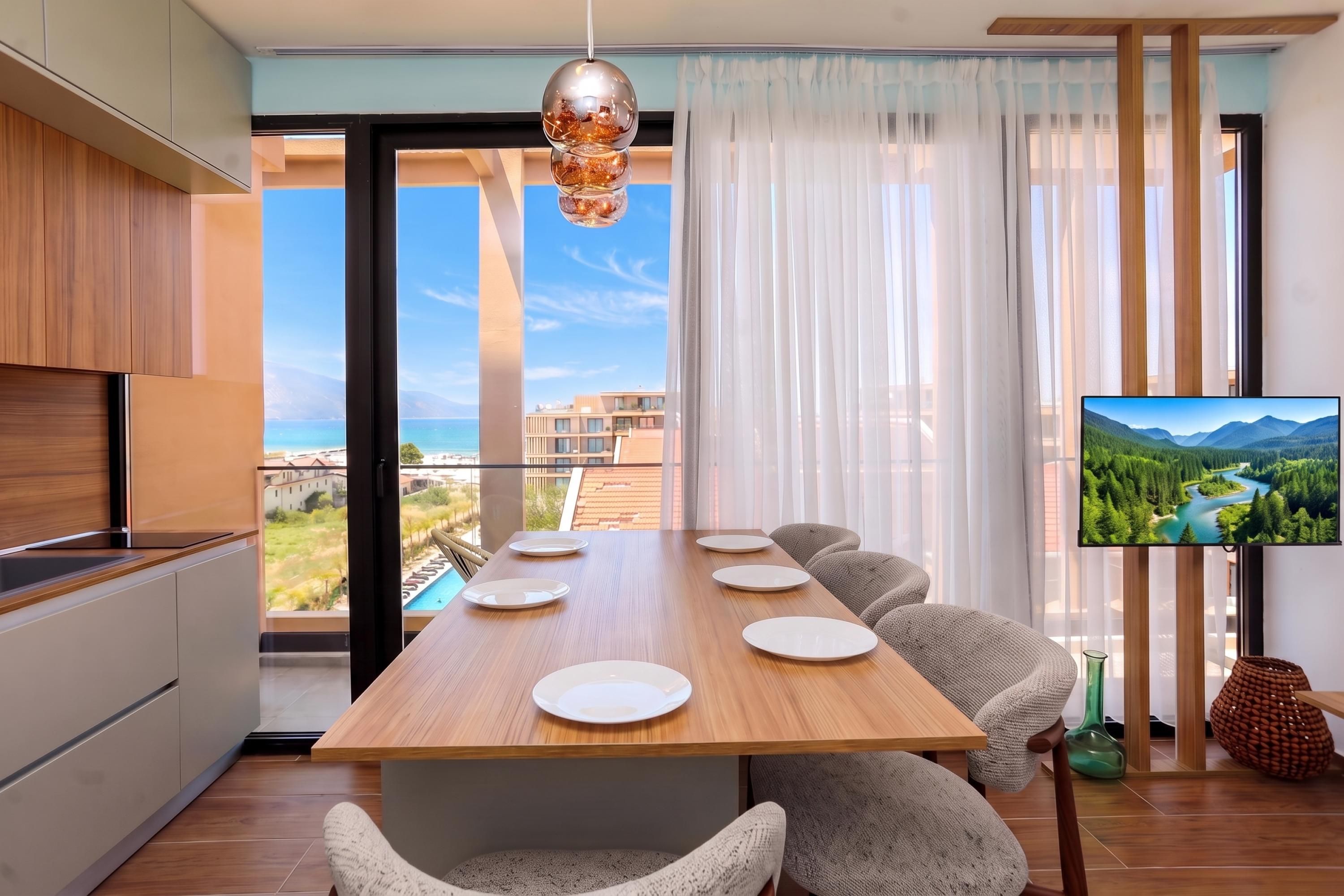 A modern dining area with a wooden table, white plates, and grey chairs.