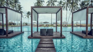 Outdoor pool, open 8:00 AM to 8:00 PM, pool umbrellas, sun loungers