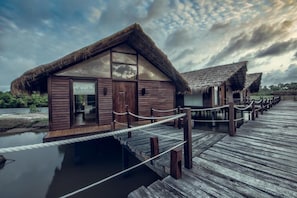 Bungalow, Balcony, Lagoon View | Exterior - Suriya Luxury resort & Spa (Waikkal)