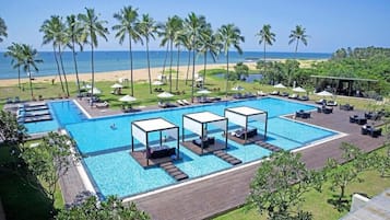 Outdoor pool, open 8:00 AM to 8:00 PM, pool umbrellas, sun loungers