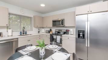 Coffee/tea maker, fridge, microwave, oven