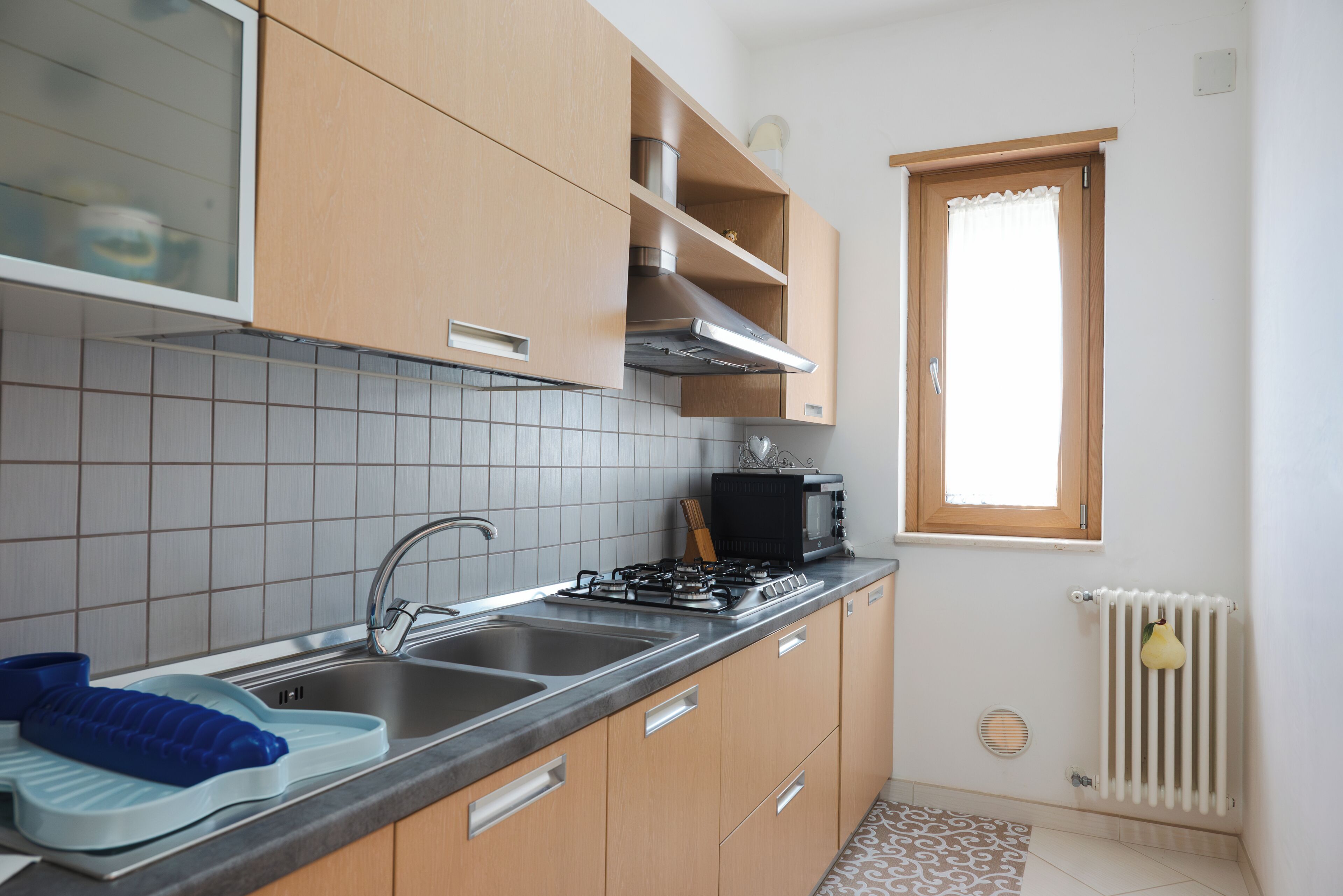 Appartement Deluxe | Cuisine privée | Réfrigérateur, four à micro-ondes, un four, surface de cuisson