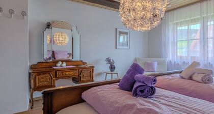 House at Kirchplatz – Apartment for 14 Guests with Balcony, Sauna, and Massage Options.