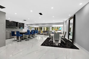 Apartamento conforto, vista para o jardim | Sala de estar