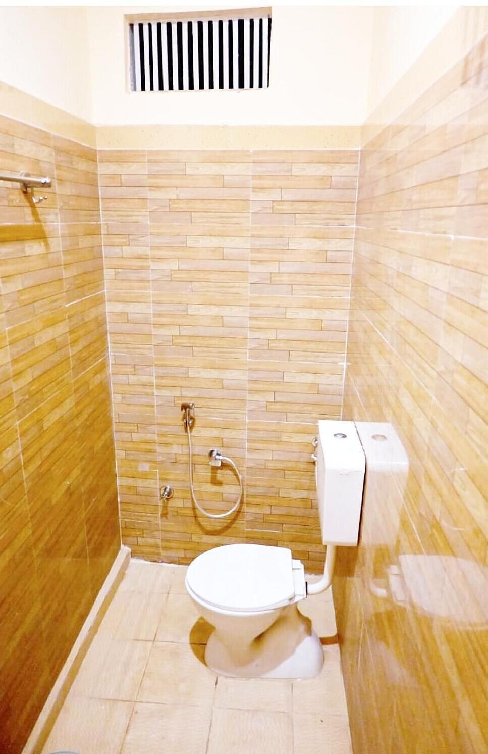Shower, rainfall showerhead, slippers, towels