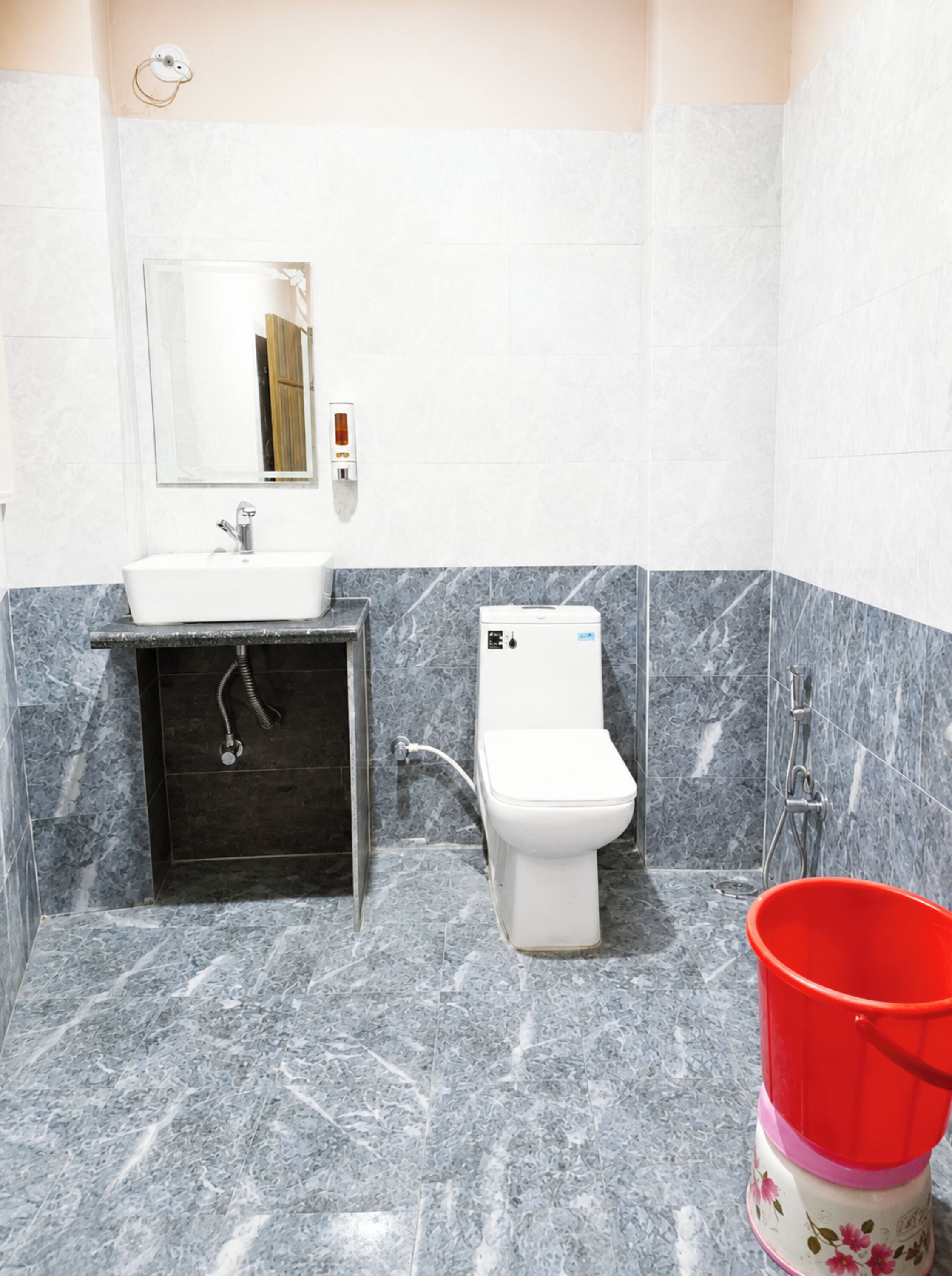 Shower, rainfall showerhead, slippers, towels